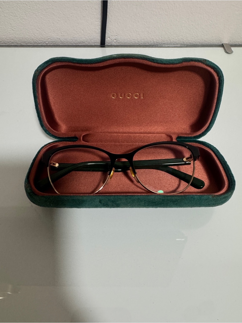 Gucci Black and Gold Round Women's Optical Glasses